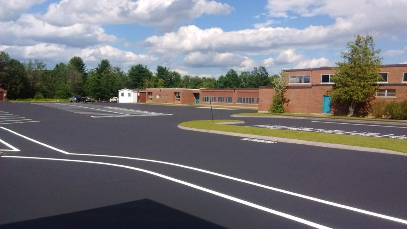Sealcoating and line striping in progress